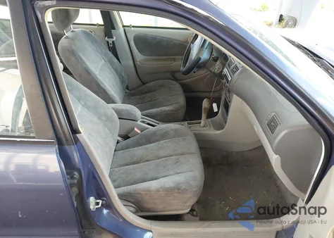 1999 Toyota Corolla Le z USA, uszkodzony, nr VIN 2T1BR12E8XC109982